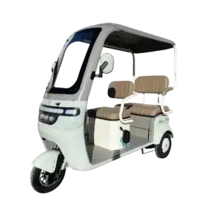 Electric rickshaw with seating for passengers, ideal for eco-friendly urban transportation and short-distance travel. Compact design suitable for city commuting and sustainable mobility solutions.