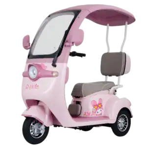 Pink kids electric tricycle with canopy, featuring a cute Hello Kitty design, ideal for children’s outdoor rides and fun adventures.